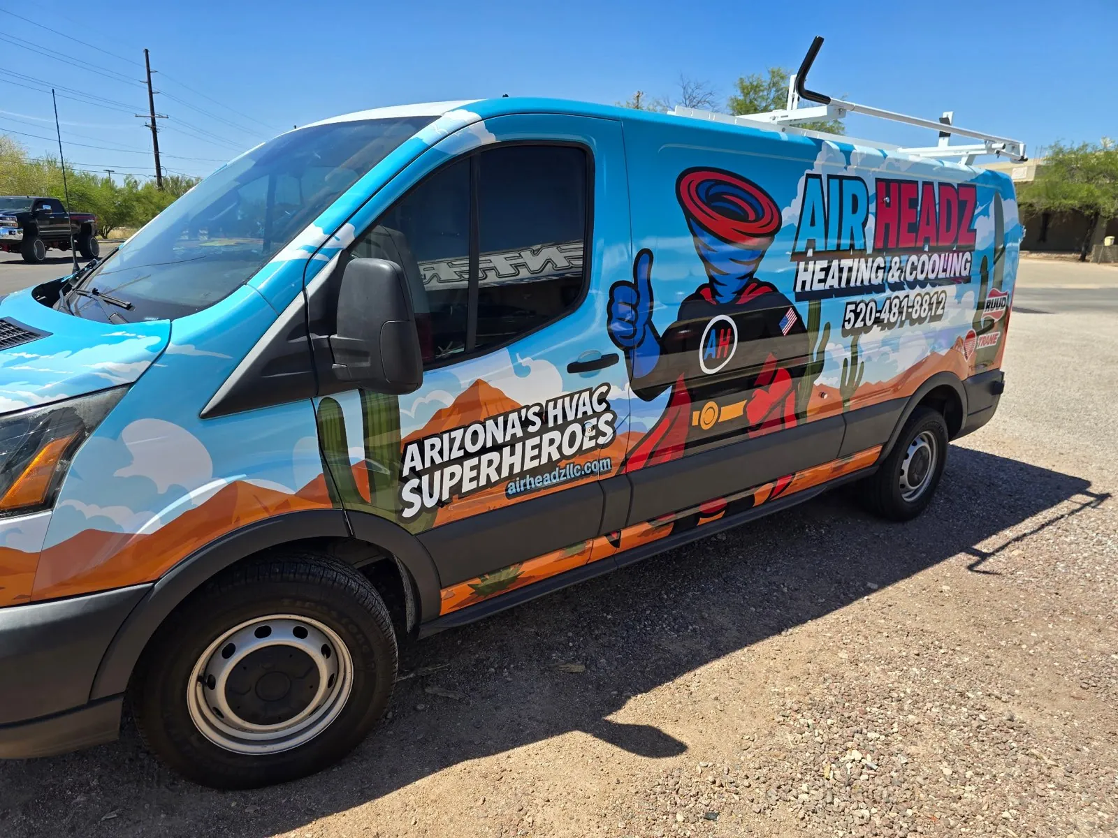 Side view of the AirHeadz wrapped service van